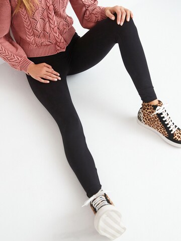 Skinny Leggings di Next in nero