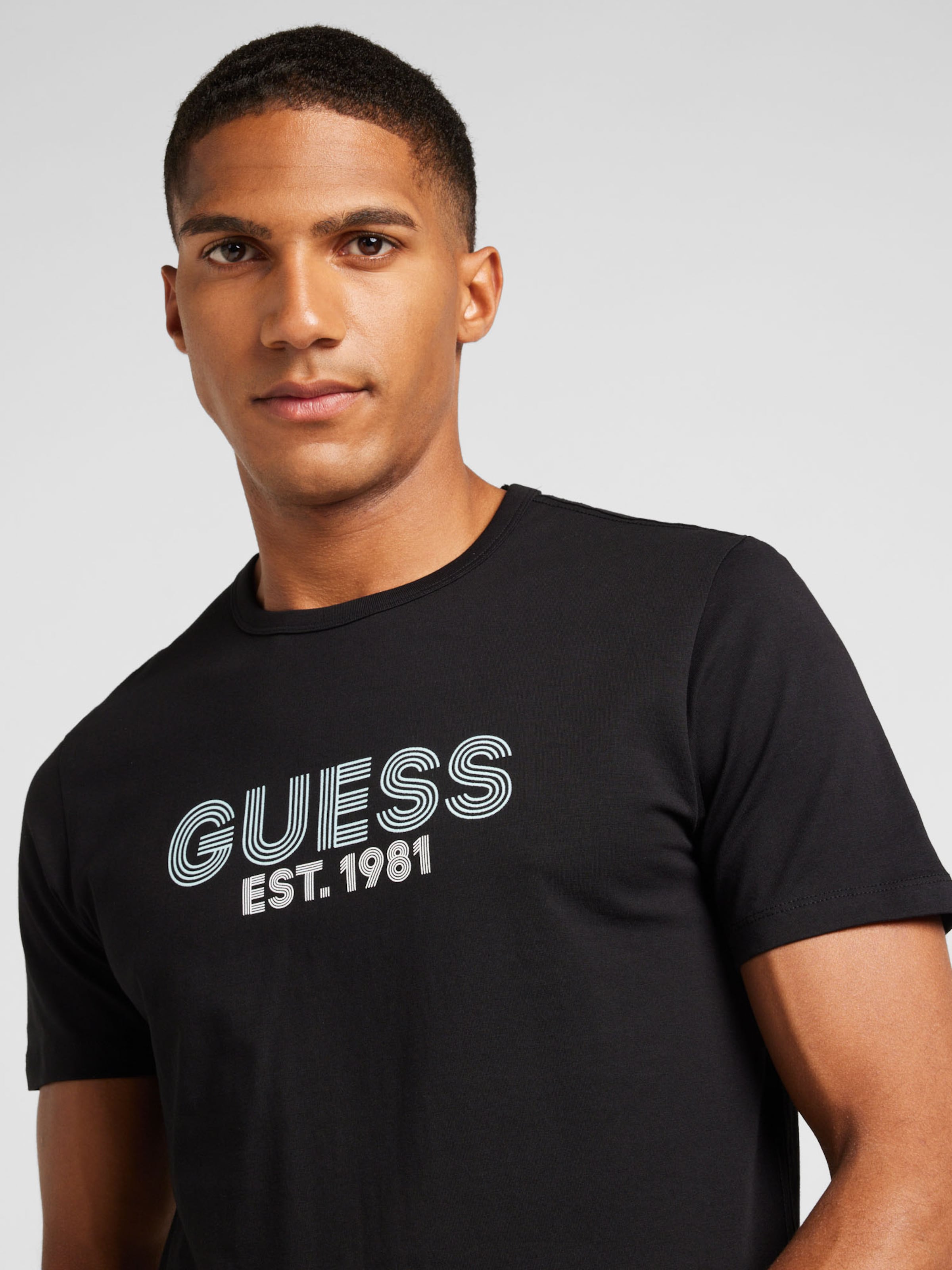 T Shirt CLASSIC GUESS en Noir ABOUT YOU