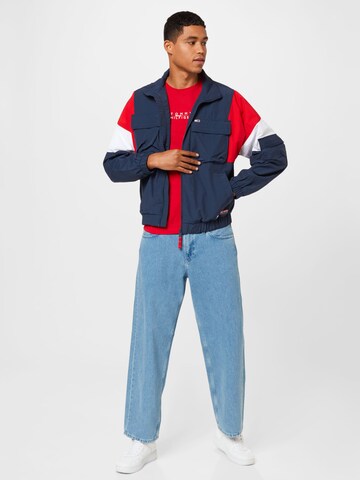 Tommy Jeans Between-Season Jacket 'Archive' in Blue