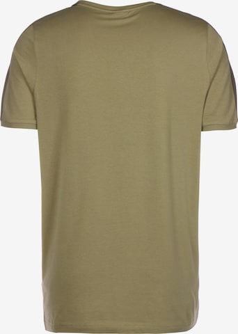PUMA T-Shirt in Grün