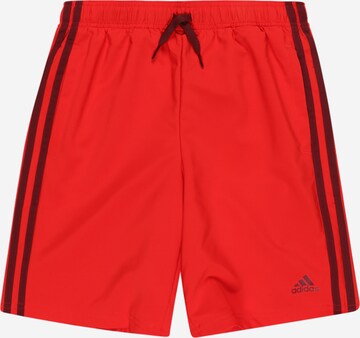 ADIDAS PERFORMANCE Workout Pants in Red: front