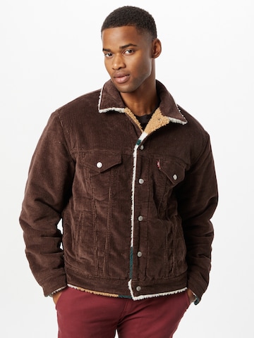 LEVI'S ®Prijelazna jakna 'Levi's® Men's Reversible Vintage Fit Sherpa Trucker Jacket' - smeđa boja: prednji dio