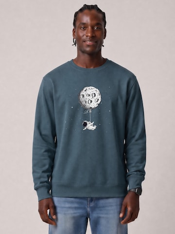 Watapparel Sweatshirt 'Funny Spaceman' in Groen: voorkant