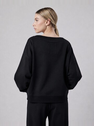 OWN Off With NatureSweater majica 'Felpa Scollo a V Loose Fit in Interlock Black' - crna boja