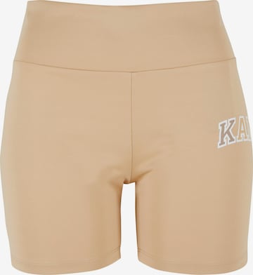 Skinny Pantalon de sport Karl Kani en beige : devant