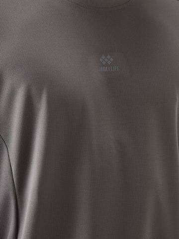 T-Shirt fonctionnel 'T-Shirts' Tommy Life en gris