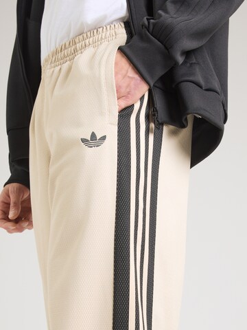 ADIDAS ORIGINALSLoosefit Hlače 'LOOSE MESH' - bež boja