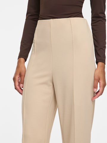 Evazați Pantaloni cu dungă de la VILA pe bej