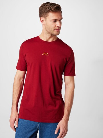 OAKLEY Klasický střih Funkční tričko 'Bark New' – červená: přední strana