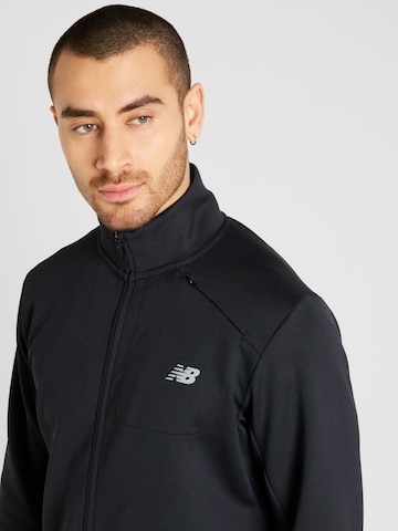 new balance Trainingsjacke 'Tech' in Schwarz