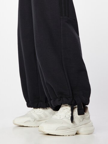 ADIDAS SPORTSWEAR Wide leg Παντελόνι φόρμας 'Dance Versatile ' σε μαύρο