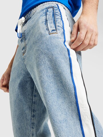 HUGO Tapered Jeans 'Yohji' in Blauw