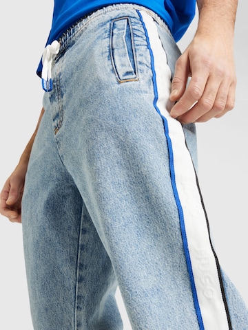 HUGO Blue Avsmalnet Jeans 'Yohji' i blå