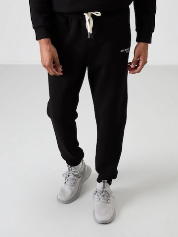 Tommy Life Joggingpak in Zwart