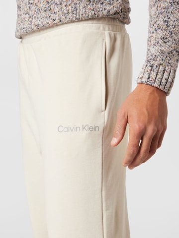 Calvin Klein Sport Tapered Workout Pants in Beige
