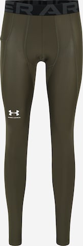 UNDER ARMOUR Skinny Workout Pants in Green: front