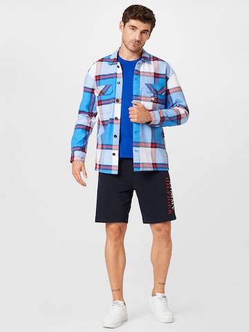 Tommy Jeans Regular fit Button Up Shirt in Blue