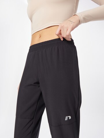 Tapered Pantaloni outdoor 'PORTLAND' de la Newline pe negru