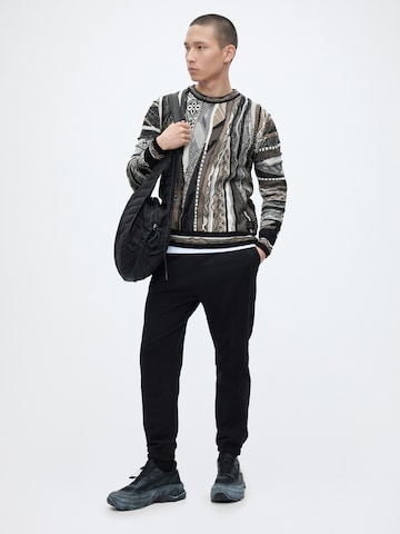 Pull-over Carlo Colucci en noir