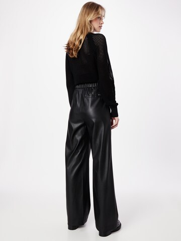 Wide leg Pantaloni 'Tokasa' di BOSS in nero