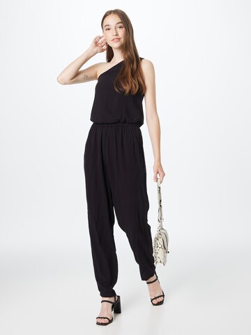 Tuta jumpsuit di DKNY in nero