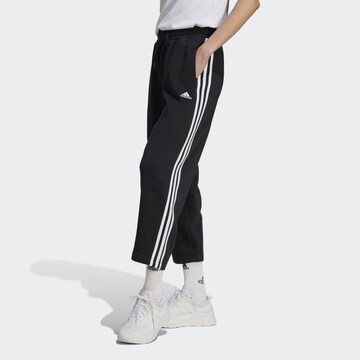 ADIDAS SPORTSWEAR Ohlapna forma Športne hlače 'Essentials 3-Stripes' | črna barva
