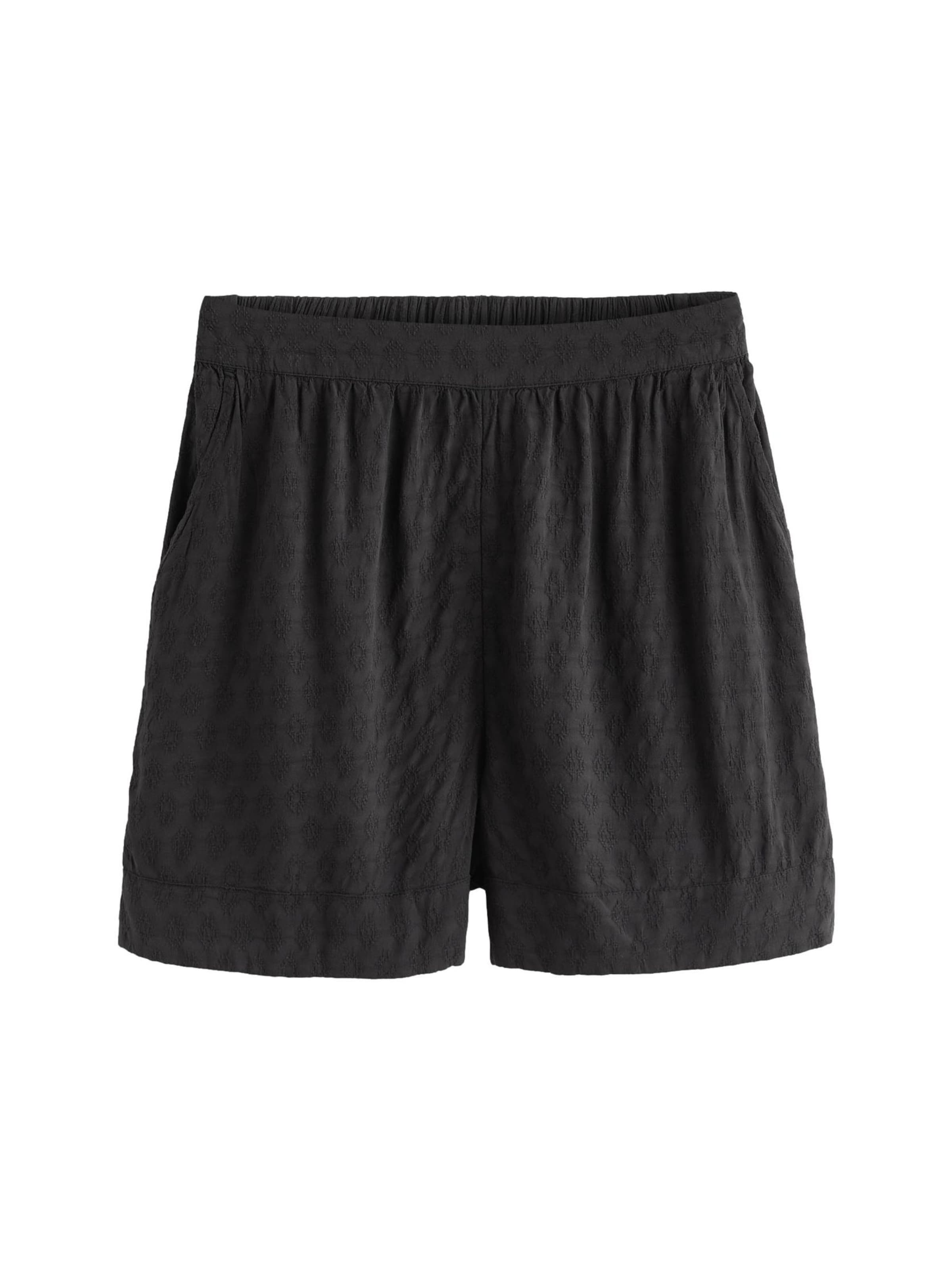 Next Bukser i sort: forside