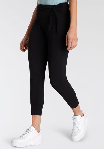 FAYN SPORTS Tapered Workout Pants in Black: front