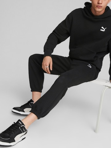 PUMA Tapered Pants in Black: front