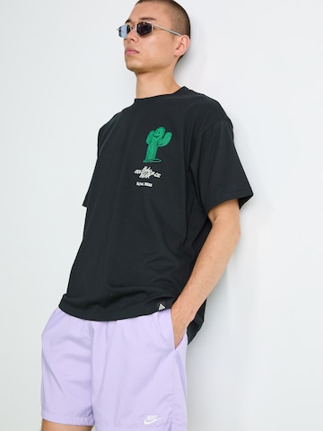 Nike Sportswear Loose fit Trousers 'CLUB' in Purple
