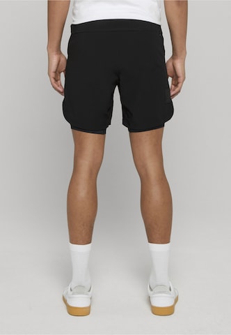 Another Cotton Lab - regular Pantalón deportivo en negro