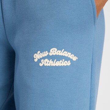 new balance Wide leg Broek 'Linear Heritage' in Blauw