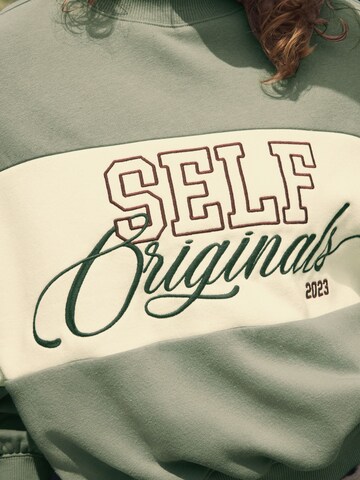 self. Sweatshirt in Groen