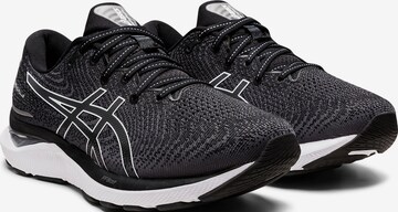 Chaussure de course 'Cumulus 24' ASICS en noir