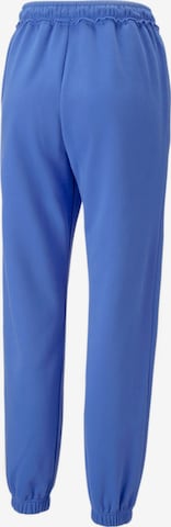 PUMA Tapered Sportbroek in Blauw