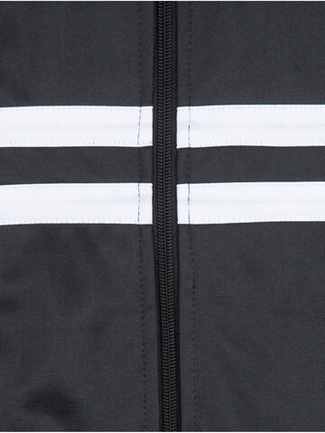 Unfair Athletics Training Jacket 'DMWU' in Black