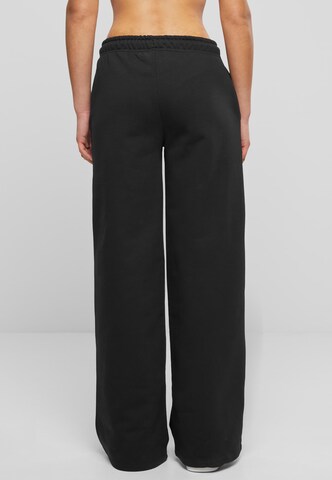 Wide leg Pantaloni di Karl Kani in nero