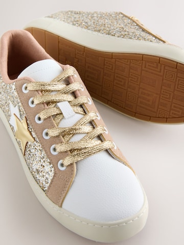 Baskets basses Next en or