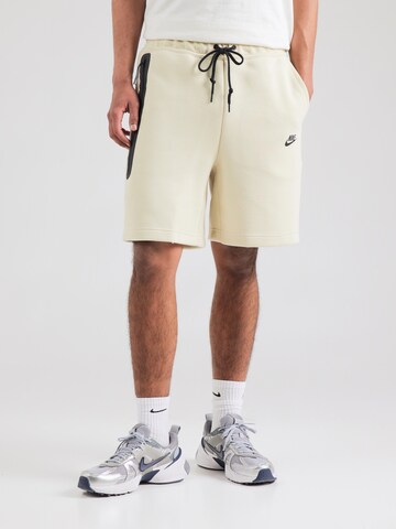 Loosefit Pantaloni 'TCH FLC' di Nike Sportswear in verde: frontale