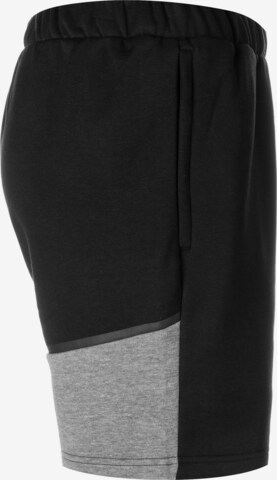 Regular Pantalon de sport 'Team Cup' PUMA en noir