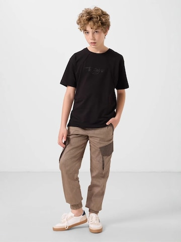 Pantalon 'TOMMY Kinder Cargo-Joggerhose' Tommy Life en marron