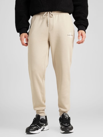 Effilé Pantalon Calvin Klein Jeans en beige : devant