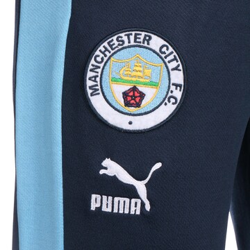 PUMA Tapered Sportbroek 'Manchester City' in Blauw