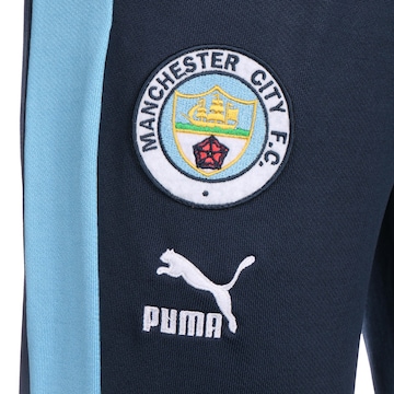 Tapered Pantaloni sportivi 'Manchester City' di PUMA in blu
