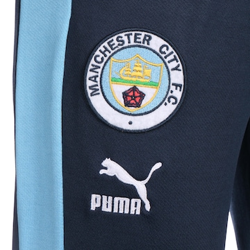 Effilé Pantalon de sport 'Manchester City' PUMA en bleu