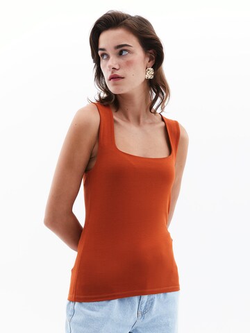 Haut OXXO en rouge