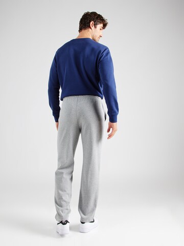 Tapered Pantaloni 'Club Fleece' di Nike Sportswear in grigio