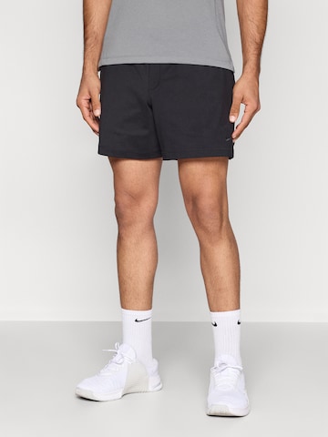NIKE Loosefit Sportsbukser 'PRMRY NANO' i sort: forside