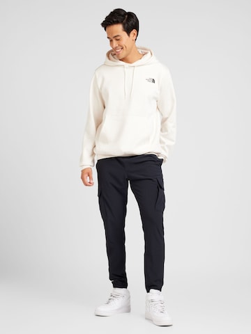 UNDER ARMOUR Normalny krój Spodnie sportowe 'Vibe' w kolorze czarny