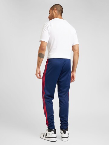 ADIDAS ORIGINALS Tapered Broek 'Adicolor Classics Sst' in Blauw
